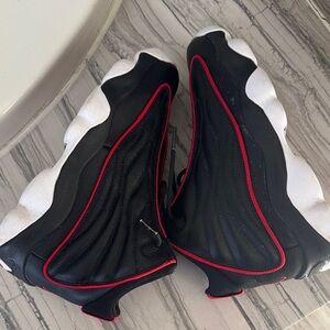 Jordan Black and White Sneakers with Red Highlights